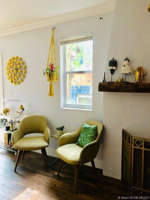 5648 Southwest 5th Terrace Miami, FL 33134 - Photo 4 of 7 a living room with furniture and a window