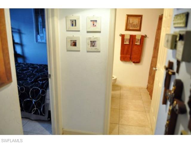 152 Cypress Way East, Unit 7 Naples, FL 34110 - Photo 13 of 21 a picture of a bathroom