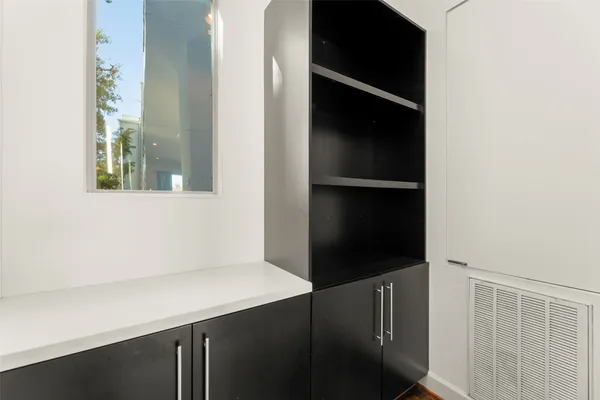 a view of an empty walk in closet