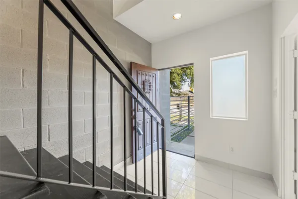 a view of an entryway with staircase