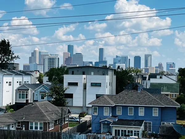 a view of city with tall buildings