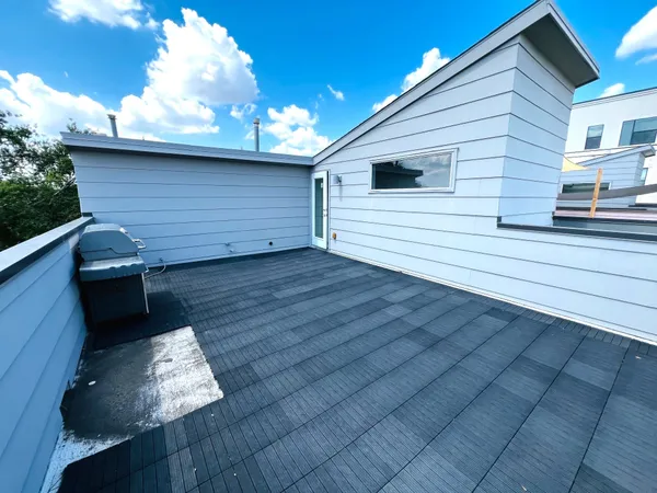 a room with furniture and a chandelier