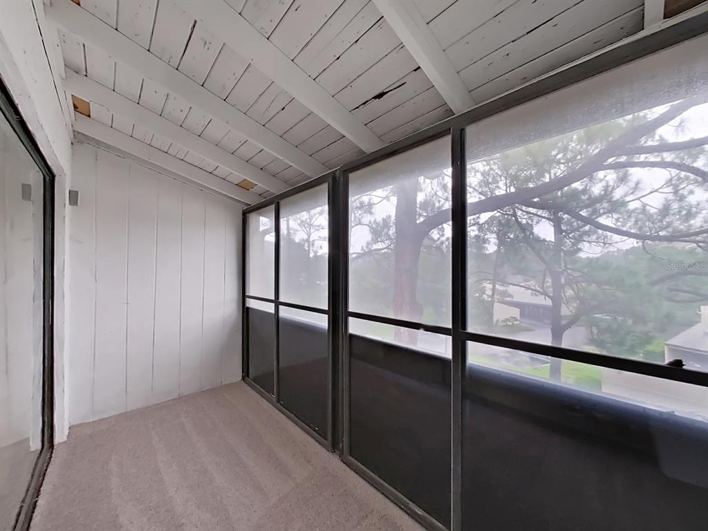 700 Starkey Road, Unit 644 Largo, FL 33771 - Photo 16 of 30 a view of empty room with wooden floor