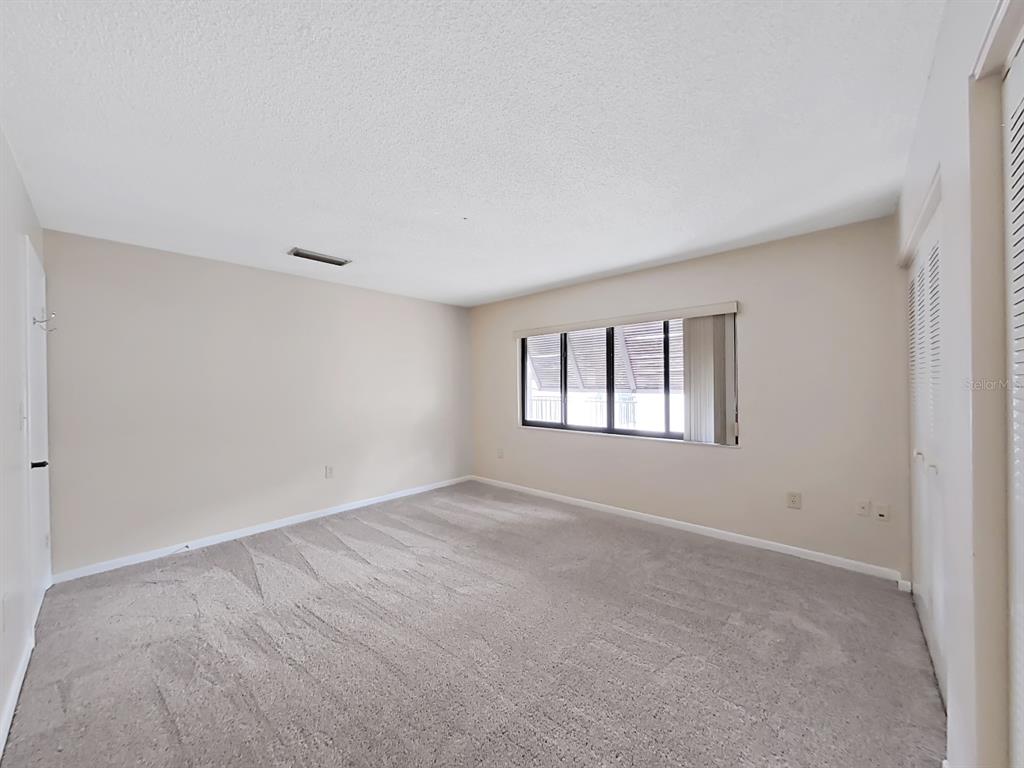 700 Starkey Road, Unit 644 Largo, FL 33771 - Photo 17 of 30 a view of an empty room with a window