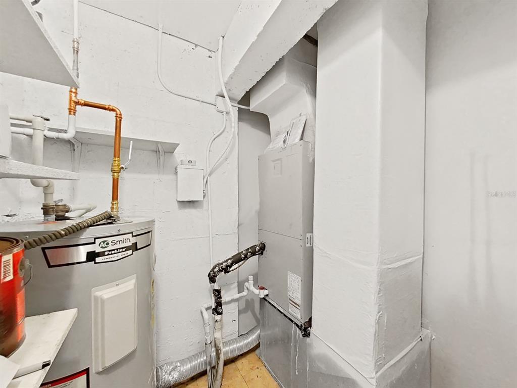 700 Starkey Road, Unit 644 Largo, FL 33771 - Photo 24 of 30 a bathroom with a sink a mirror and shower