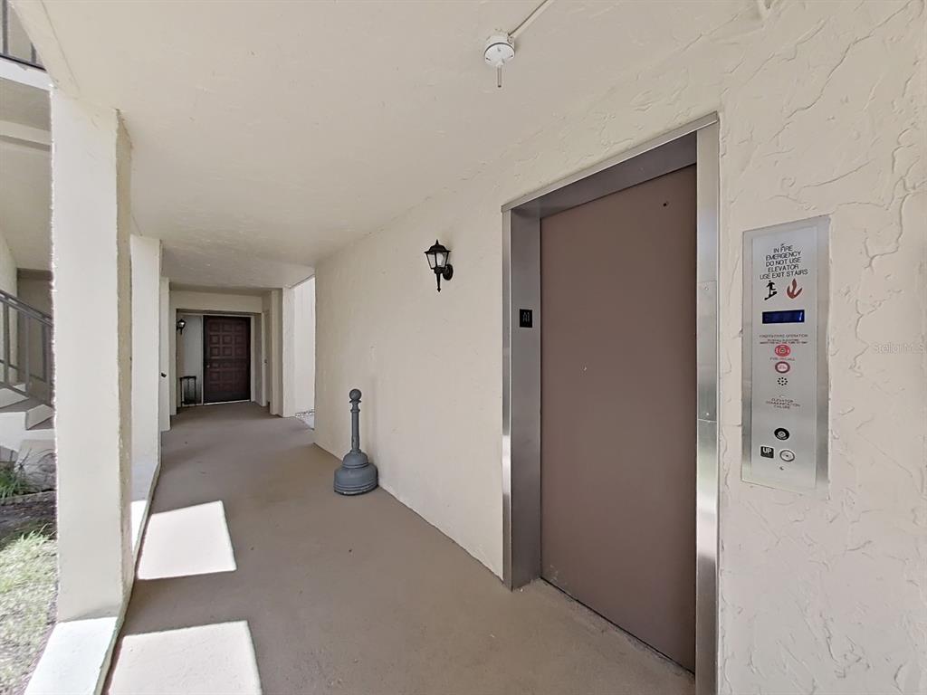 700 Starkey Road, Unit 644 Largo, FL 33771 - Photo 27 of 30 a view of empty room with wooden floor