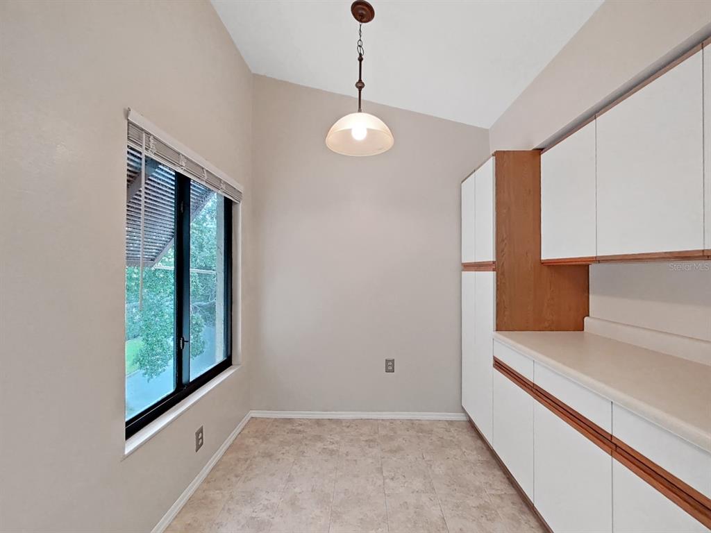 700 Starkey Road, Unit 644 Largo, FL 33771 - Photo 9 of 30 a view of a room with window and wooden floor