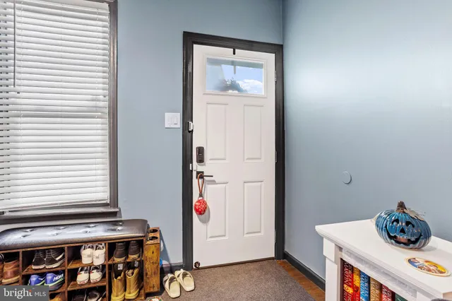 a room with furniture and white walls