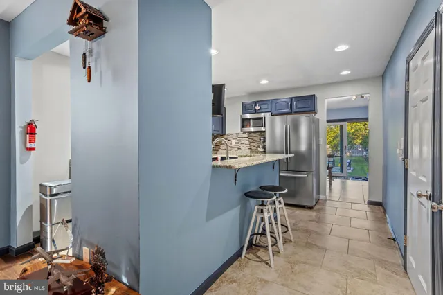 a workspace with furniture and a window