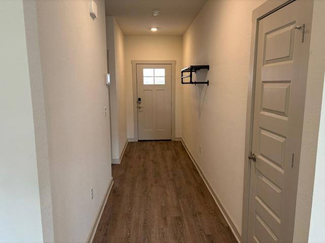 10925 Defender Trail Austin, TX 78754 - Photo 6 of 7 A welcoming entryway with rich wood-look flooring guides guests into the home.