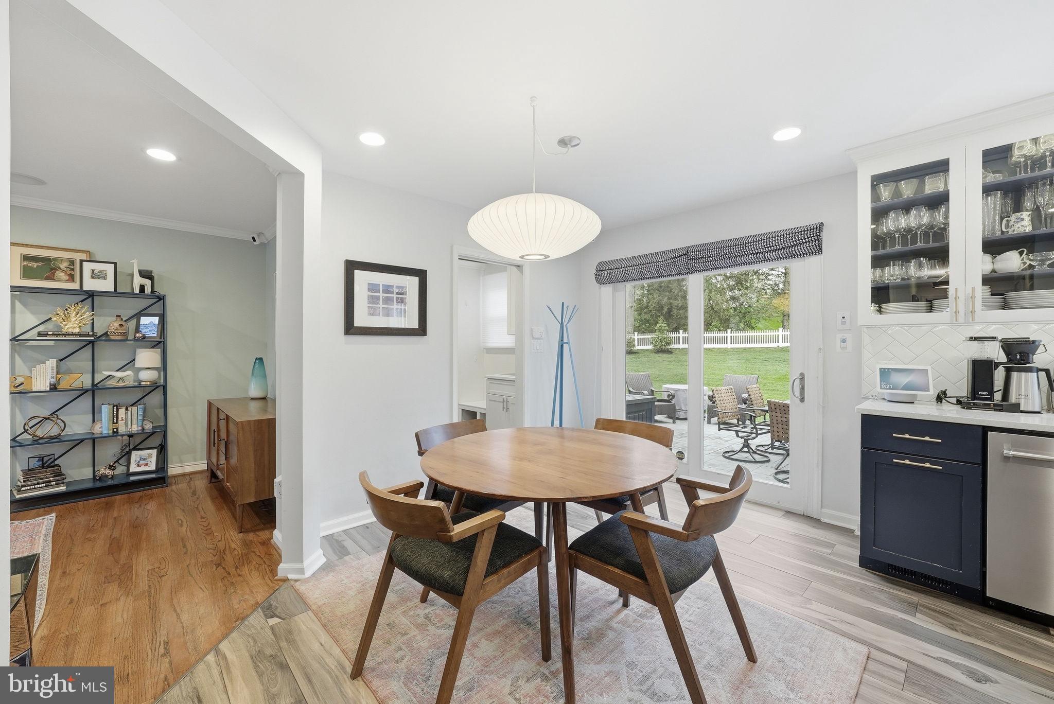 9503 Rockport Road Vienna, VA 22180 - Photo 13 of 48 a view of a dining room with furniture and wooden floor