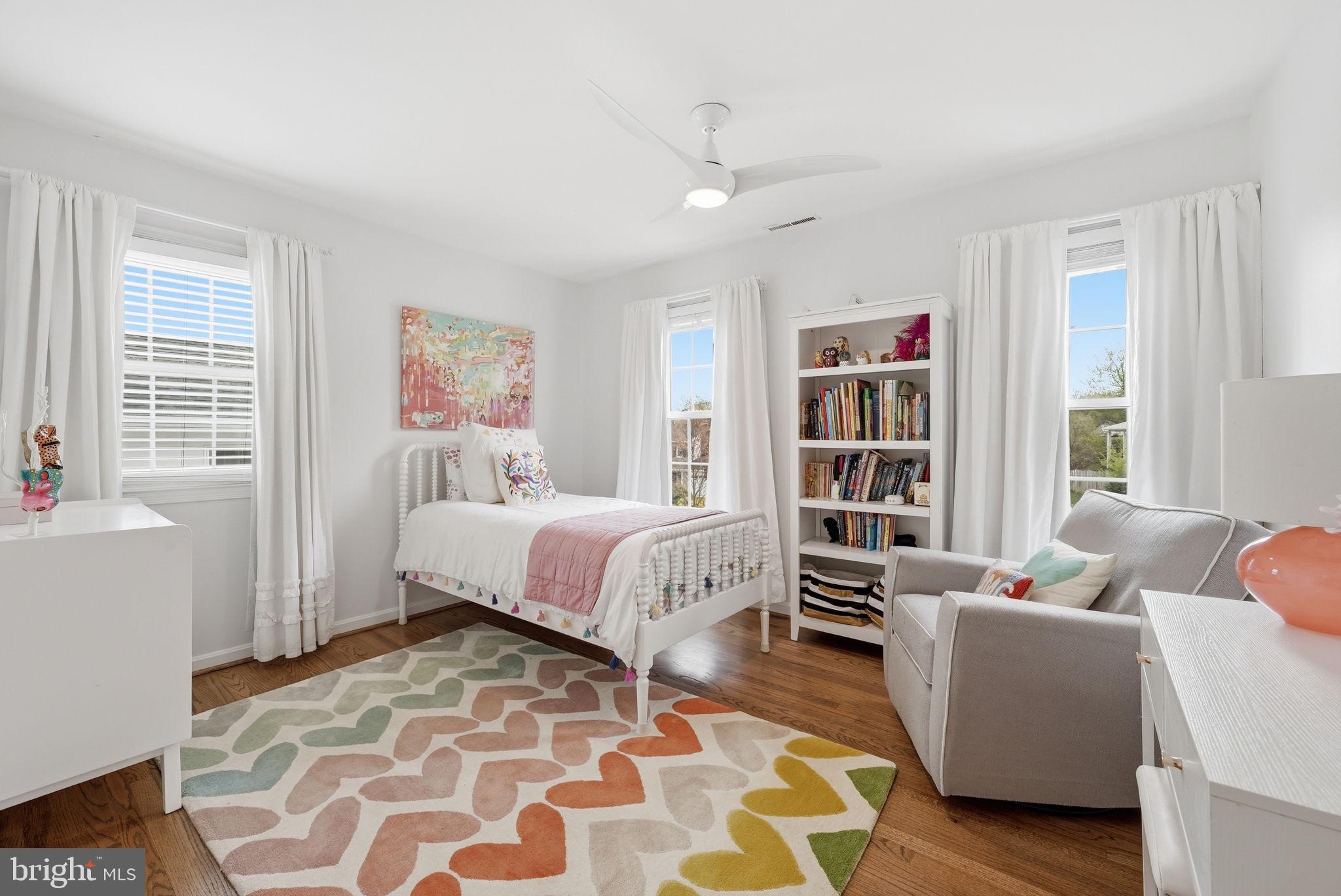9503 Rockport Road Vienna, VA 22180 - Photo 27 of 48 a spacious bedroom with a bed and a couch