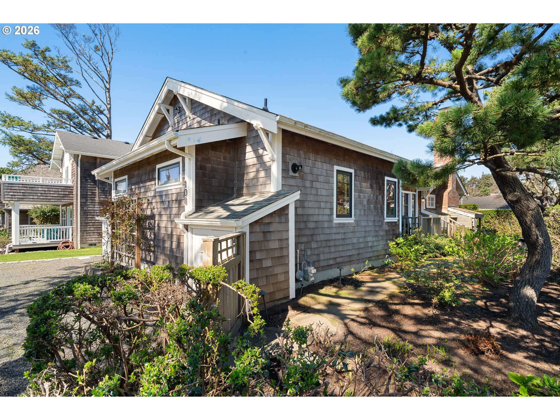 108 West Madison Street Cannon Beach, OR 97110 - Photo 2 of 45 a view of a back yard of the house