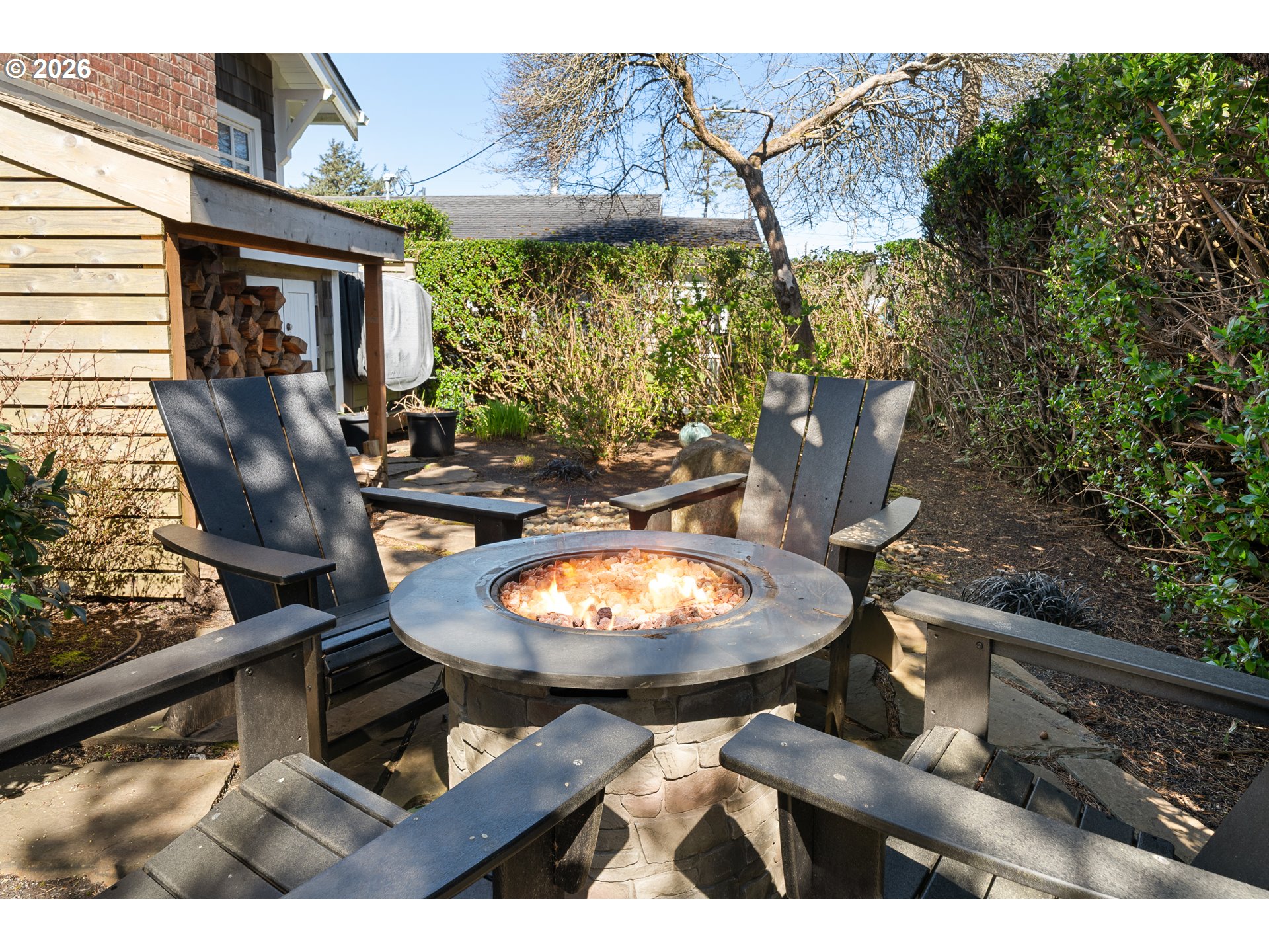 108 West Madison Street Cannon Beach, OR 97110 - Photo 6 of 45 a view of a chairs and table in the patio