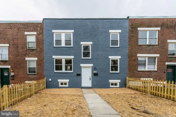 a brick building with a large windows