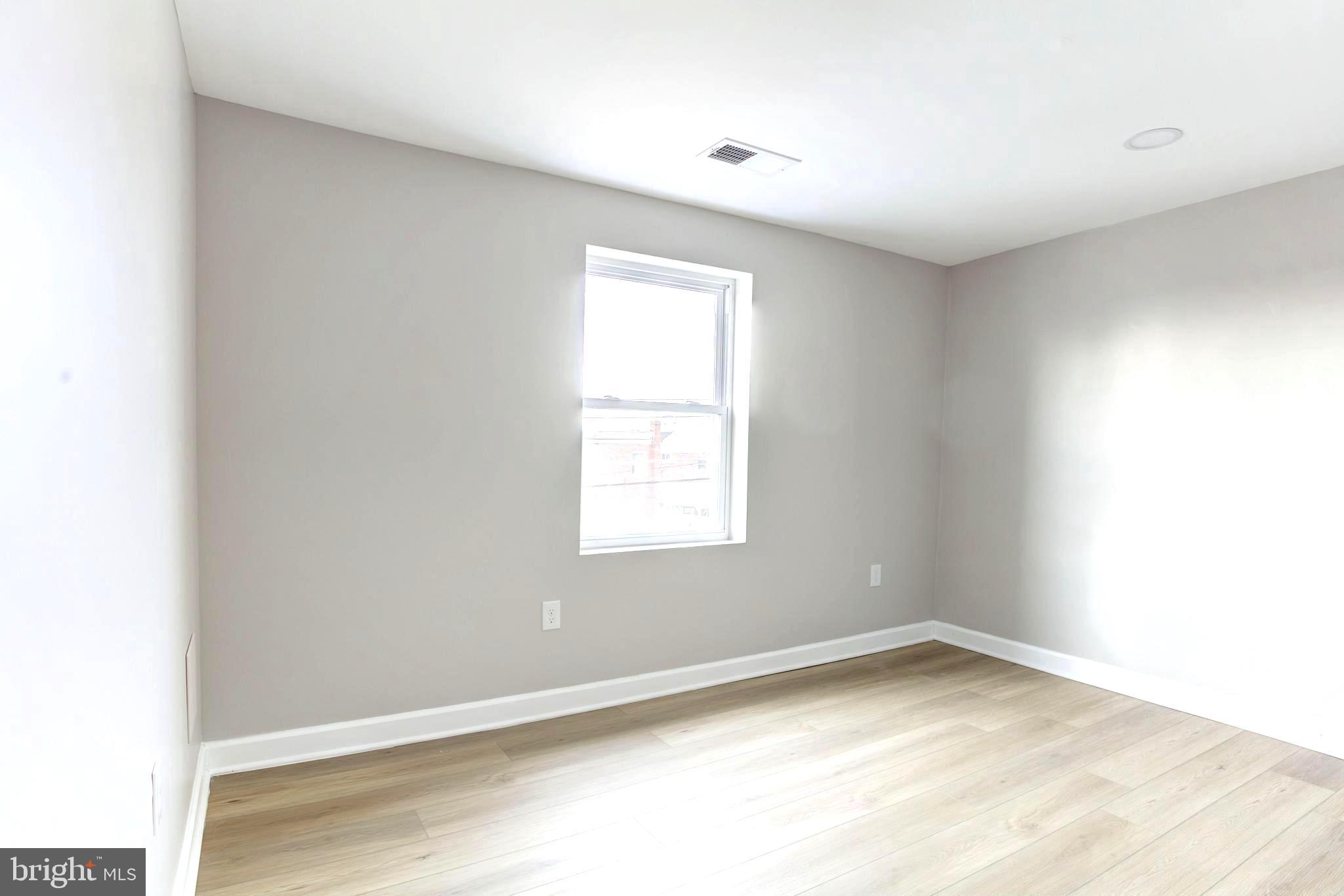 1012 Elton Avenue Baltimore, MD 21224 - Photo 25 of 30 an empty room with a window