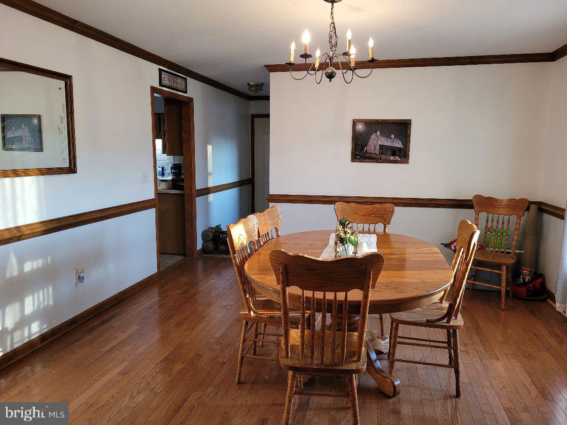36423 Robin Hood Road Delmar, DE 19940 - Photo 9 of 25 Formal Dining Room/crown molding