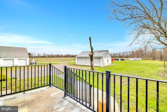 a view of a street with a trees in the background
