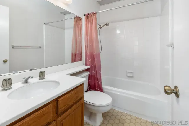 a view of a backyard of the house