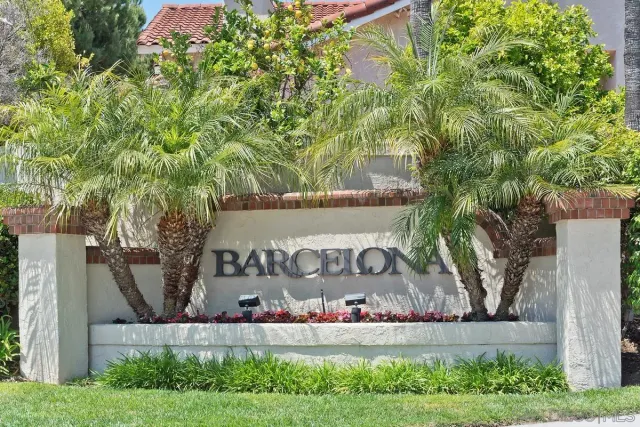 a view of a garden with a fountain