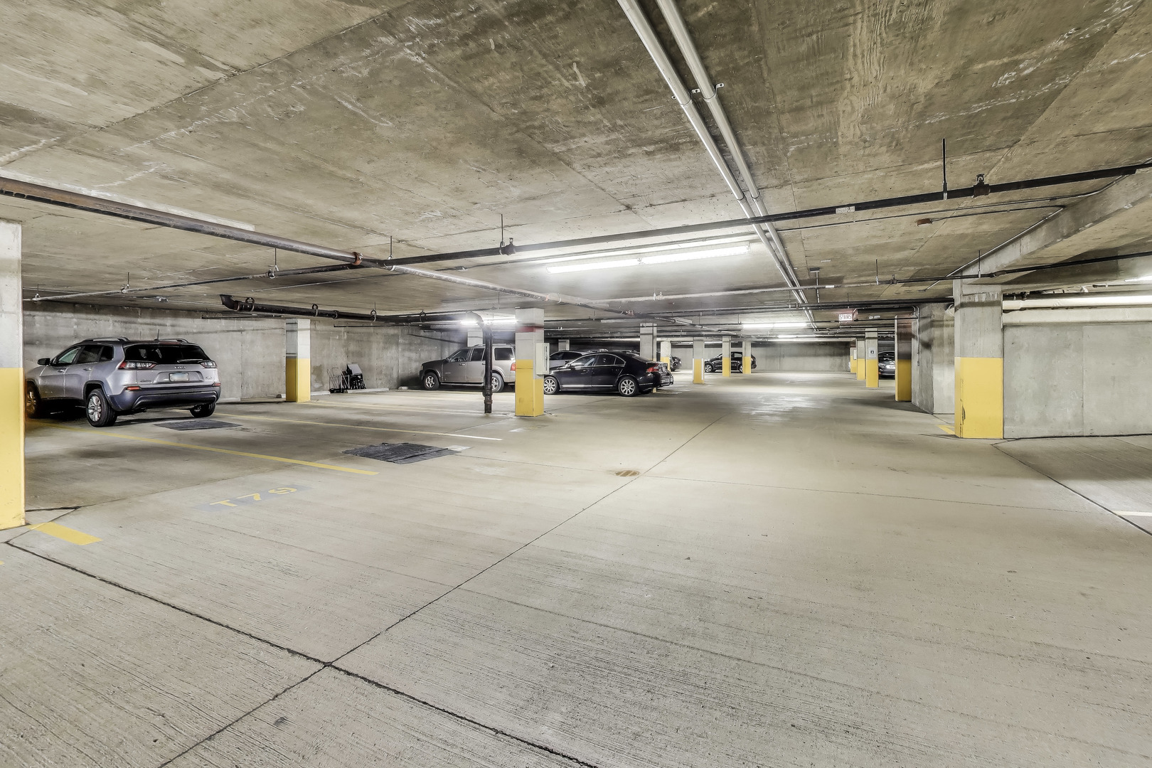 1000 West Adams Street, Unit 815 Chicago, IL 60607 - Photo 33 of 40 a view of parking garage with cars