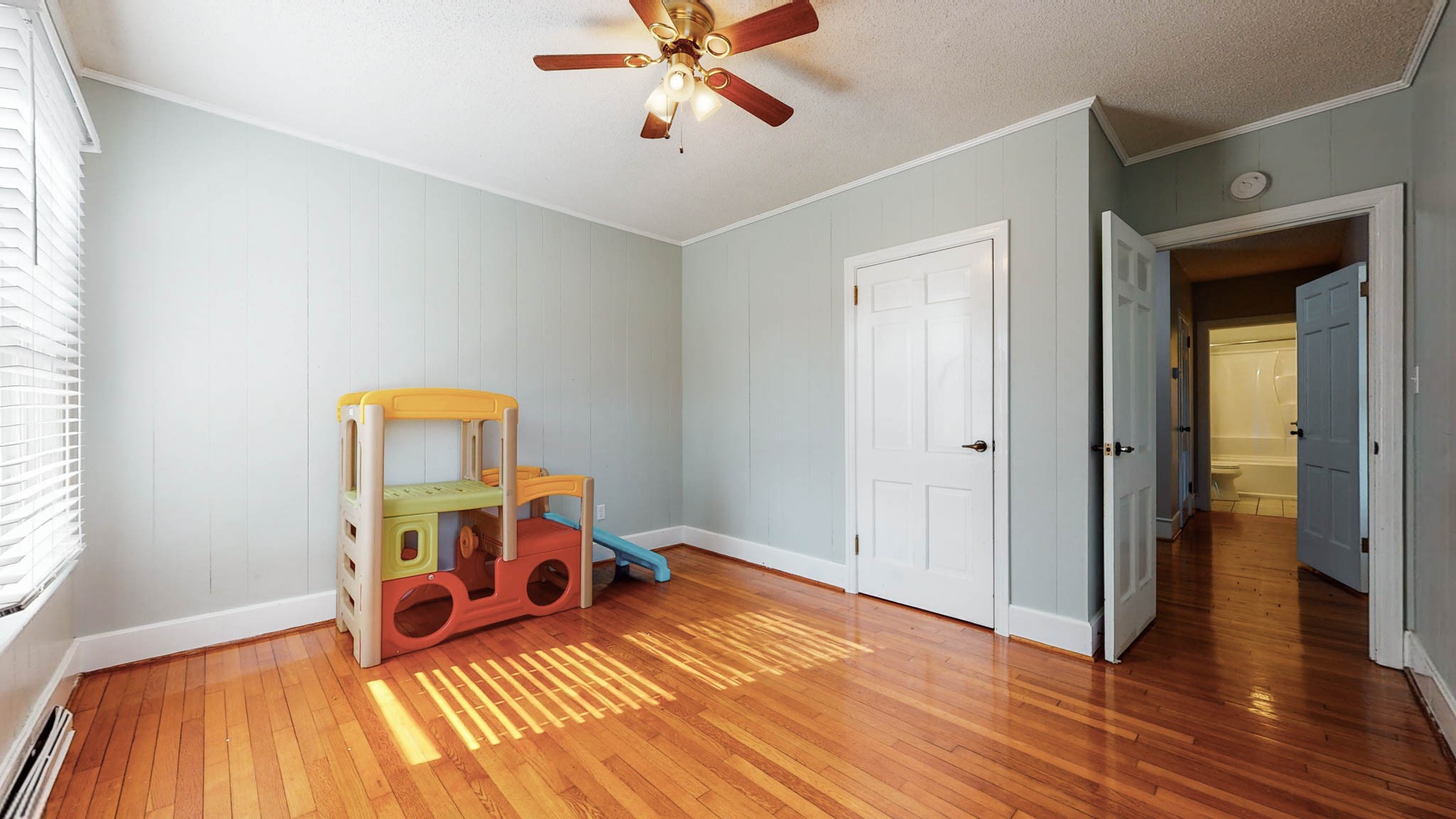 241 Hunt Creek Road Manchester, TN 37355 - Photo 18 of 33 a bedroom with a bed and wooden floor
