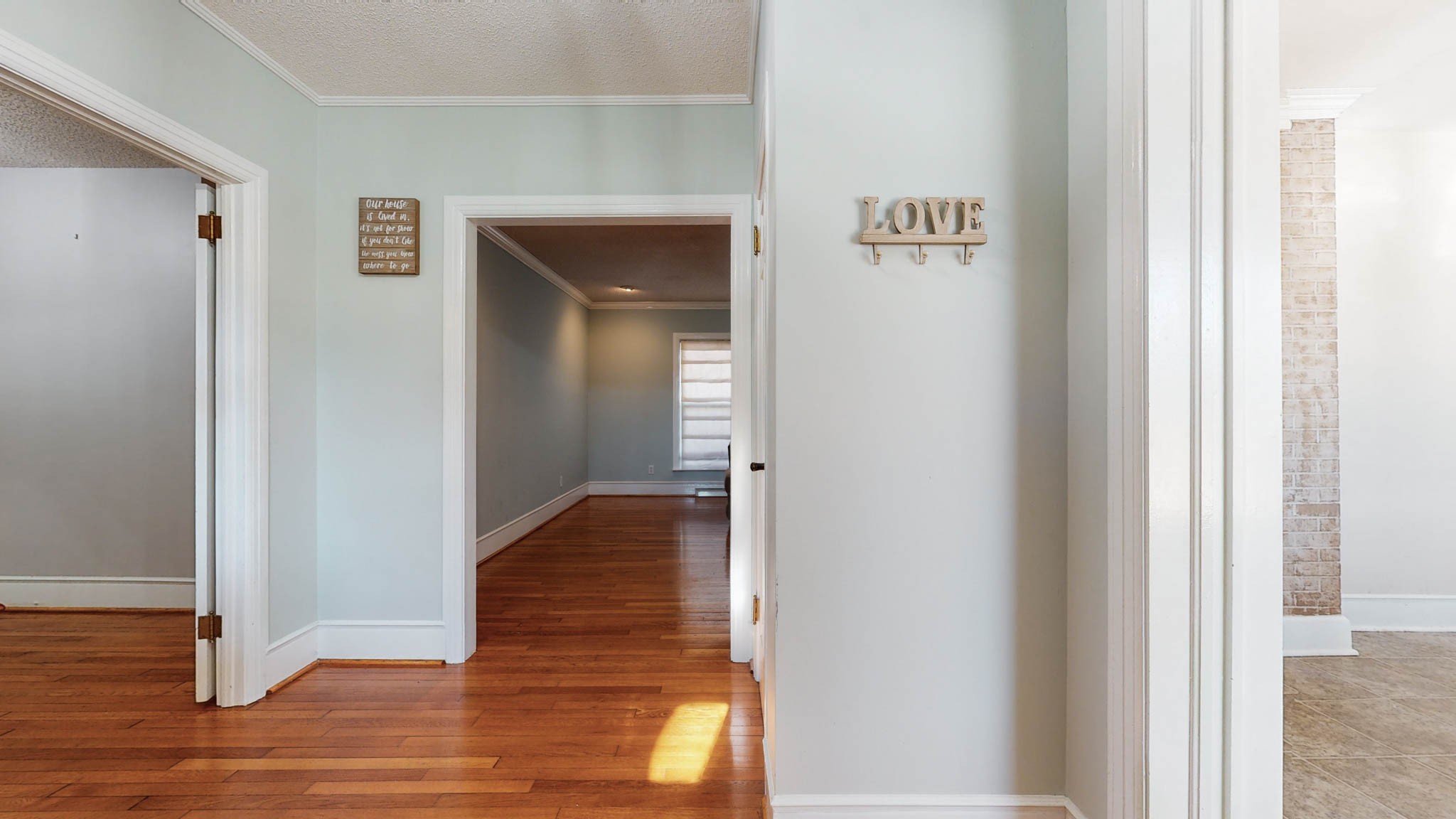 241 Hunt Creek Road Manchester, TN 37355 - Photo 2 of 33 a view of a hallway with wooden floor