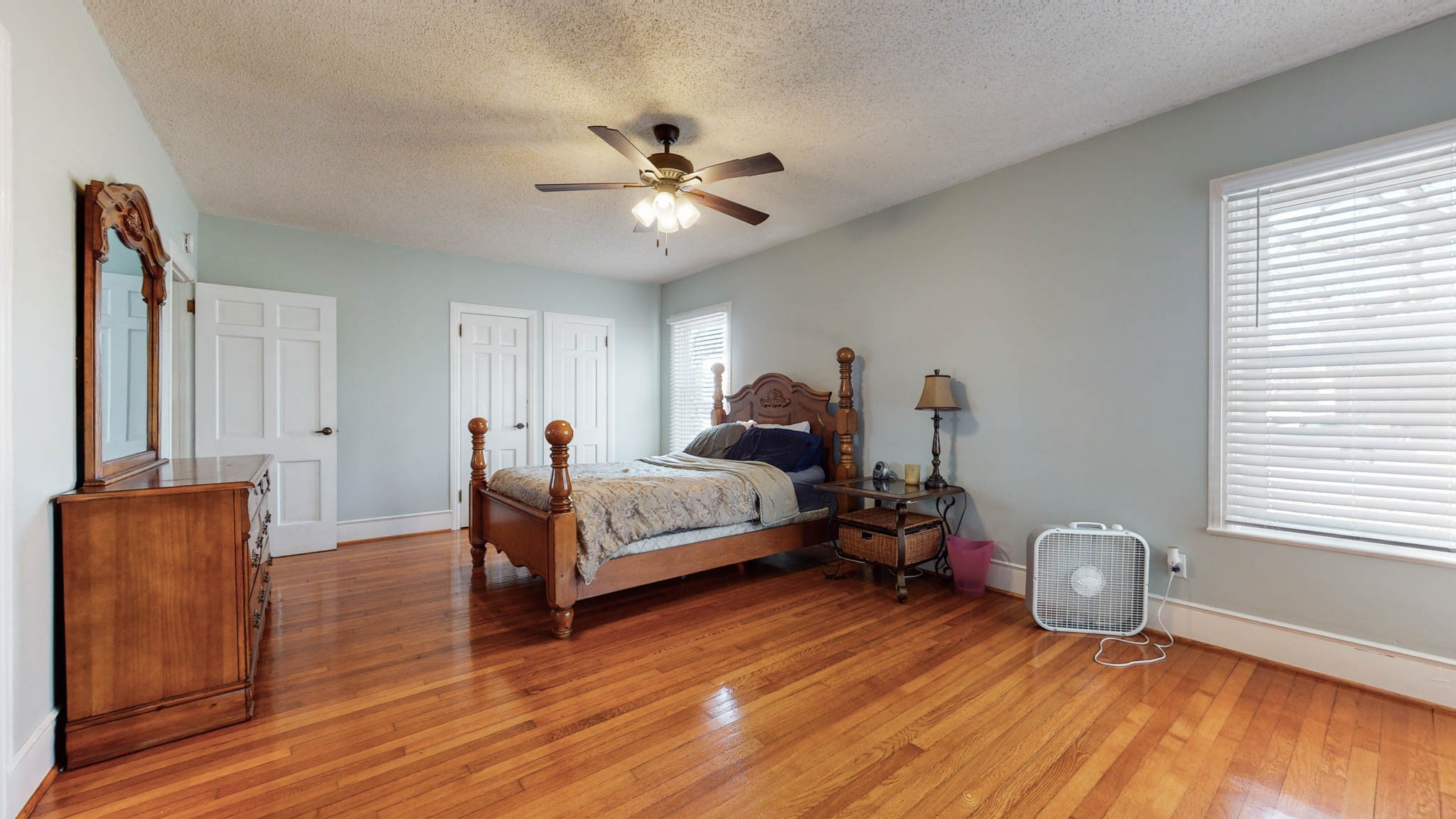 241 Hunt Creek Road Manchester, TN 37355 - Photo 23 of 33 a bed room with a bed and a chandelier