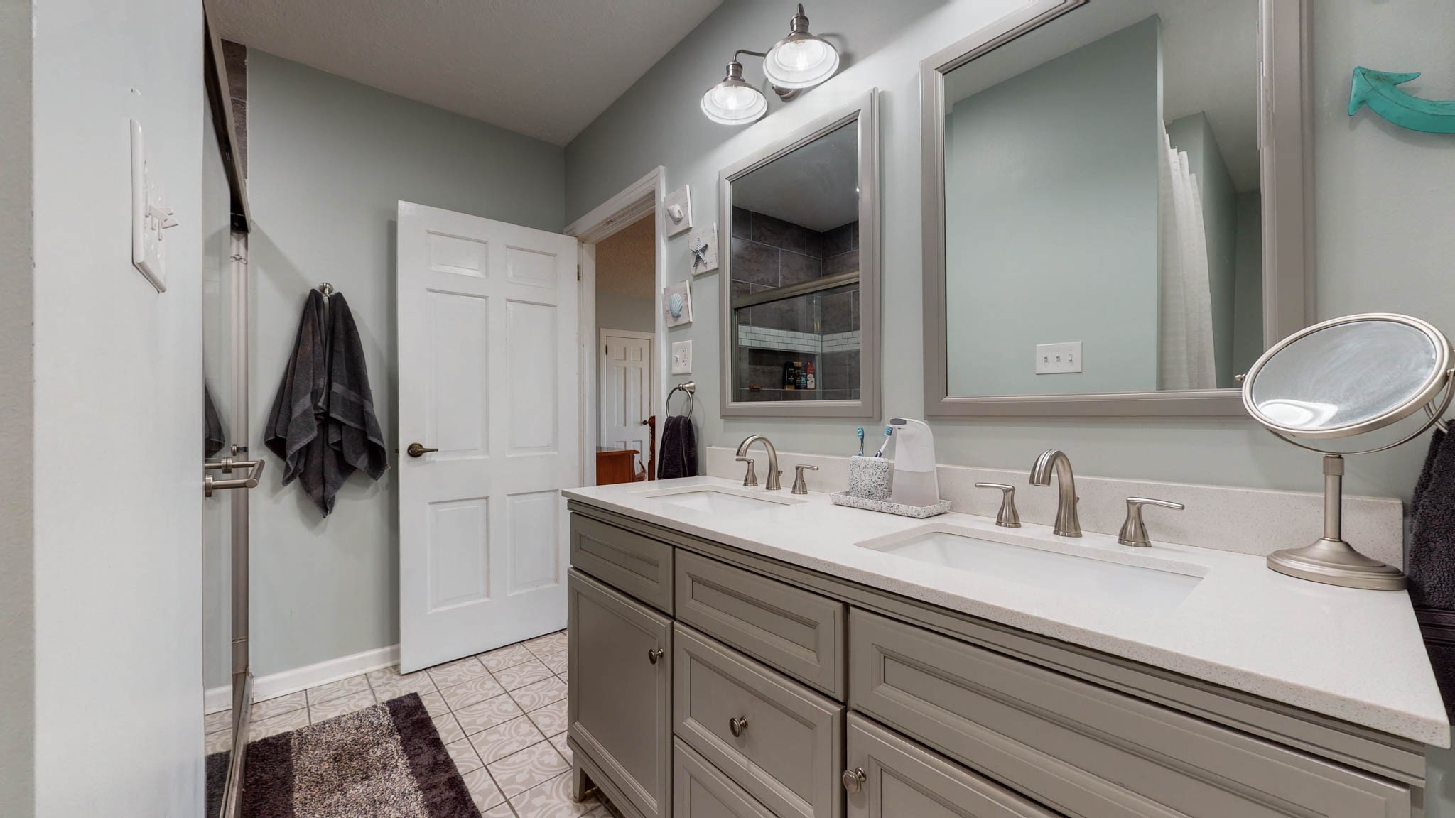 241 Hunt Creek Road Manchester, TN 37355 - Photo 26 of 33 a bathroom with a sink double vanity and a mirror