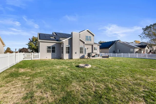 a big house with a big yard and more windows