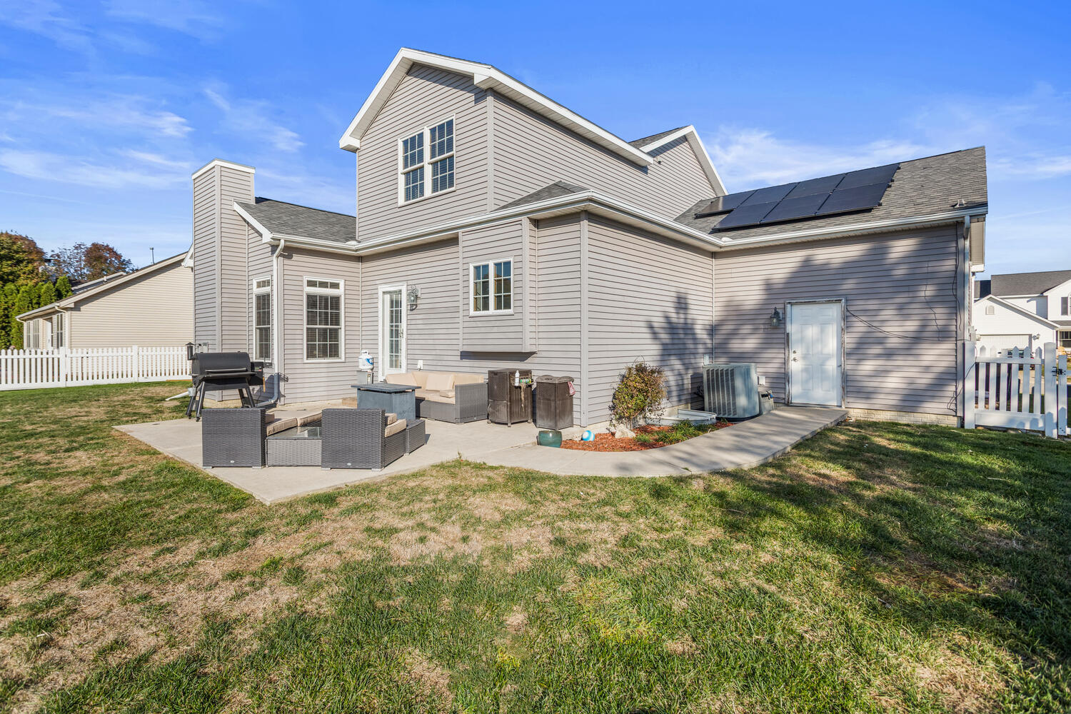 407 West Walnut Street Tolono, IL 61880 - Photo 8 of 15 a view of a house with backyard and sitting area