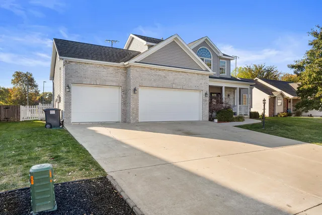 a house view with a garden space