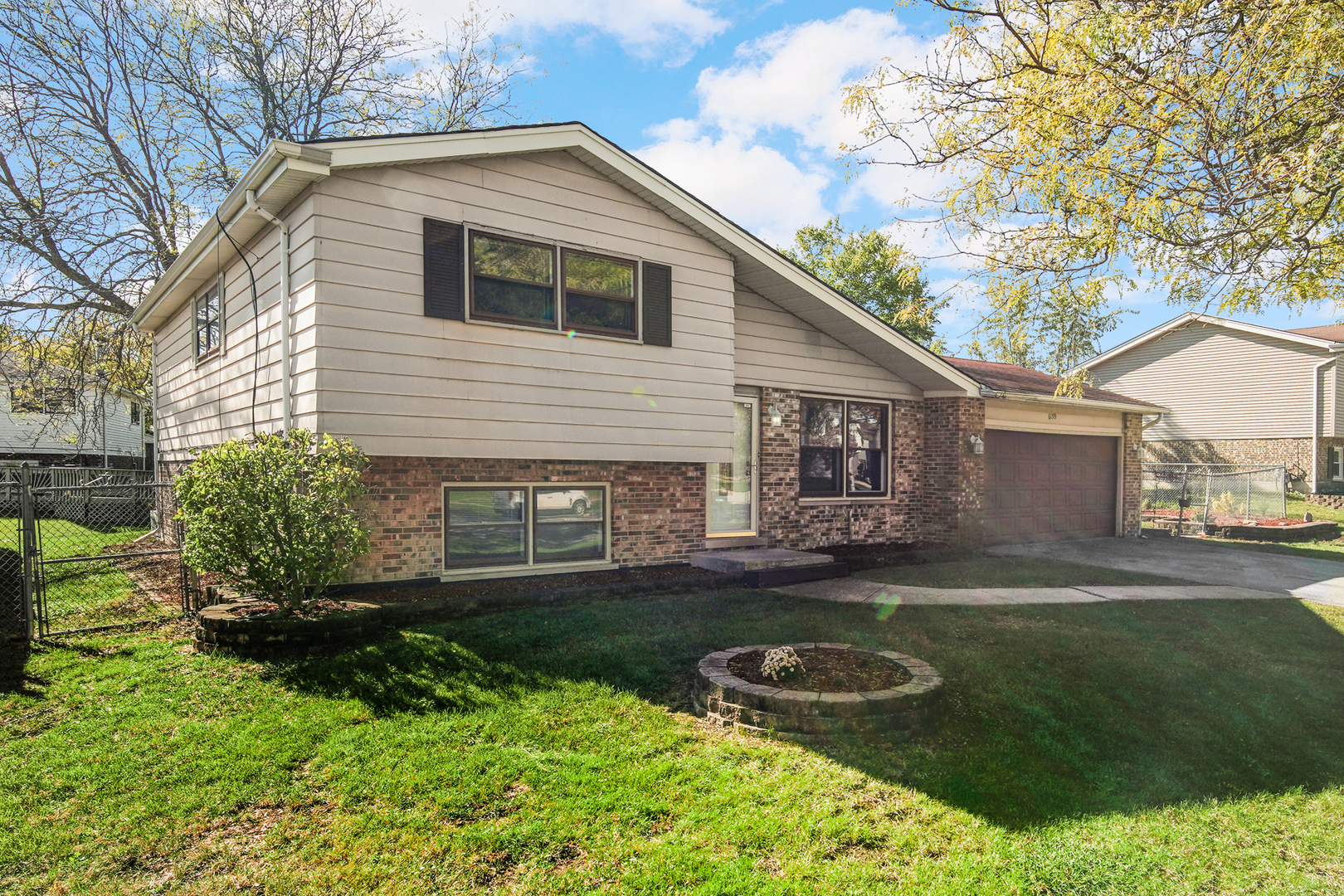 6159 Beechwood Road Matteson, IL 60443 - Photo 2 of 21 a backyard of a house with seating space