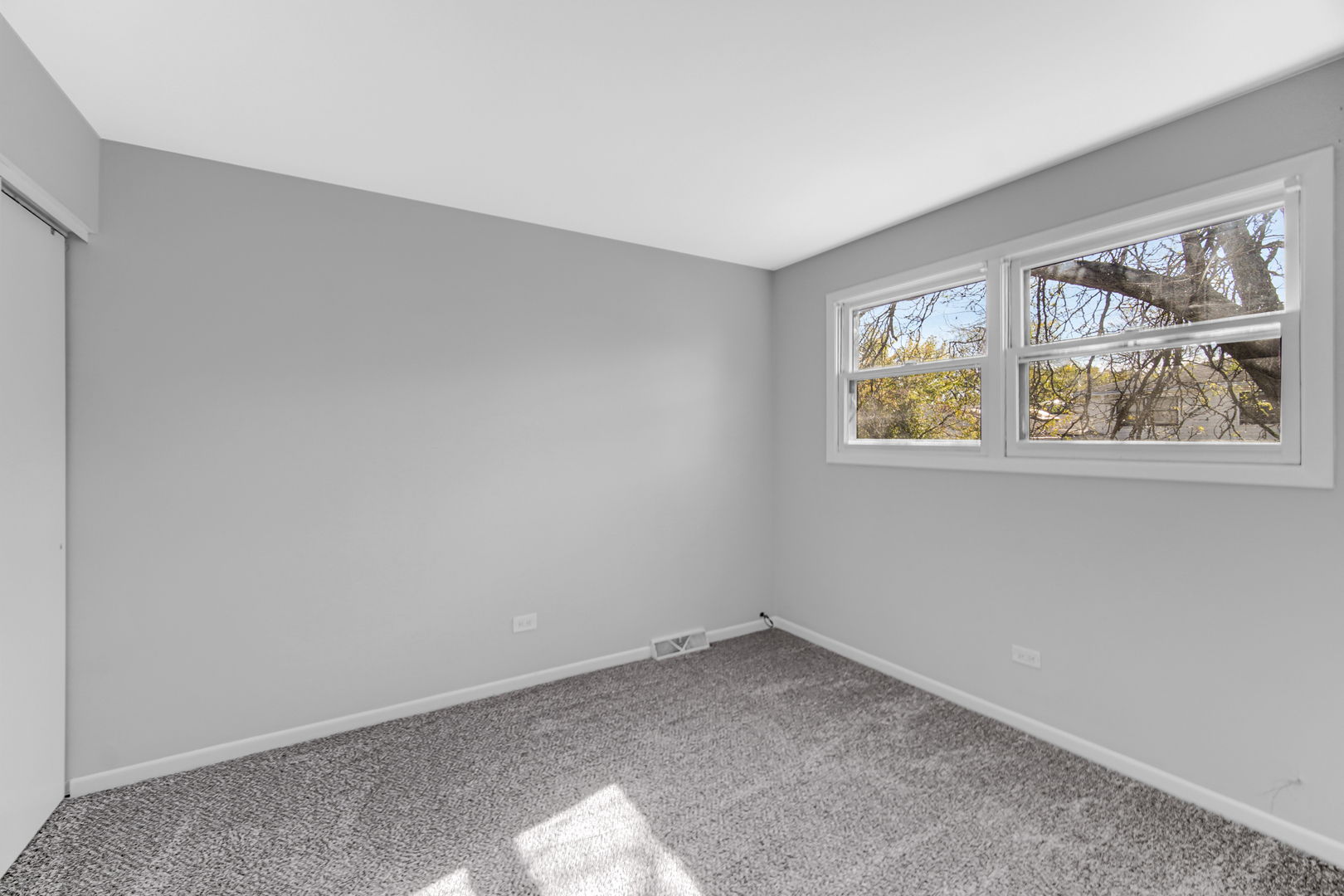 6159 Beechwood Road Matteson, IL 60443 - Photo 11 of 21 an empty room with a window