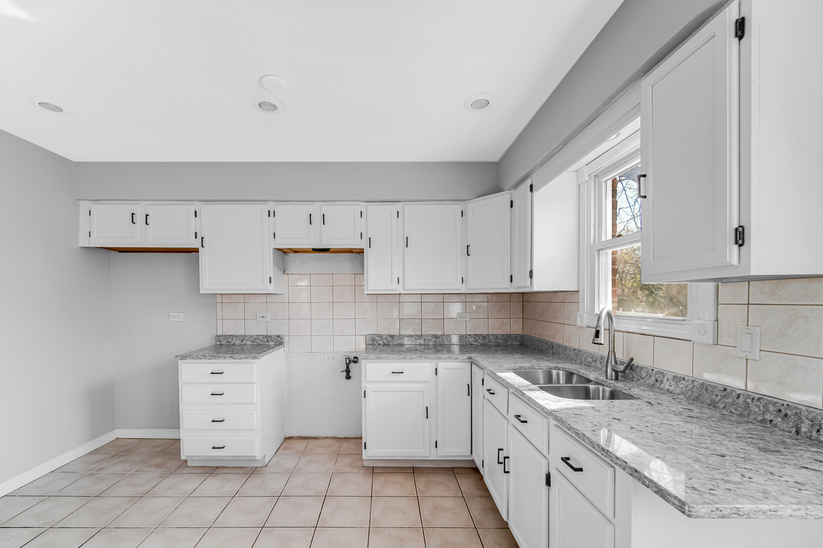 6159 Beechwood Road Matteson, IL 60443 - Photo 8 of 21 a kitchen with white cabinets white appliances and sink