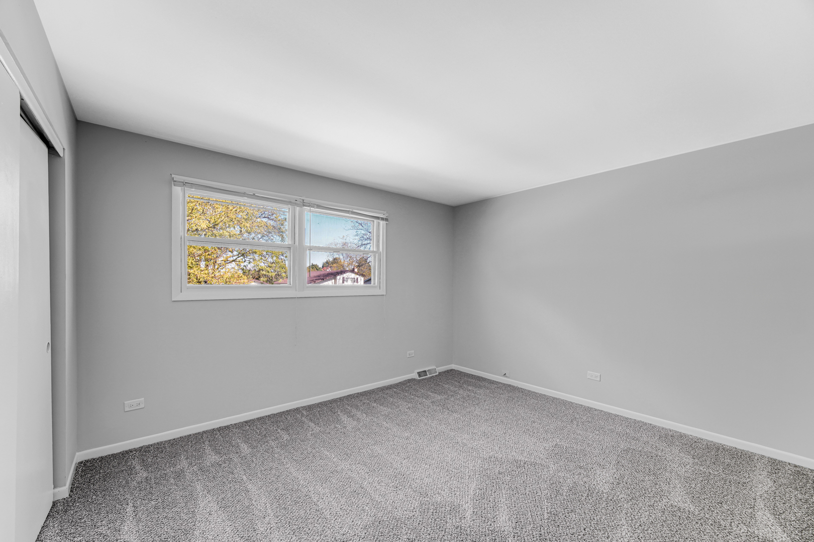 6159 Beechwood Road Matteson, IL 60443 - Photo 9 of 21 an empty room with windows