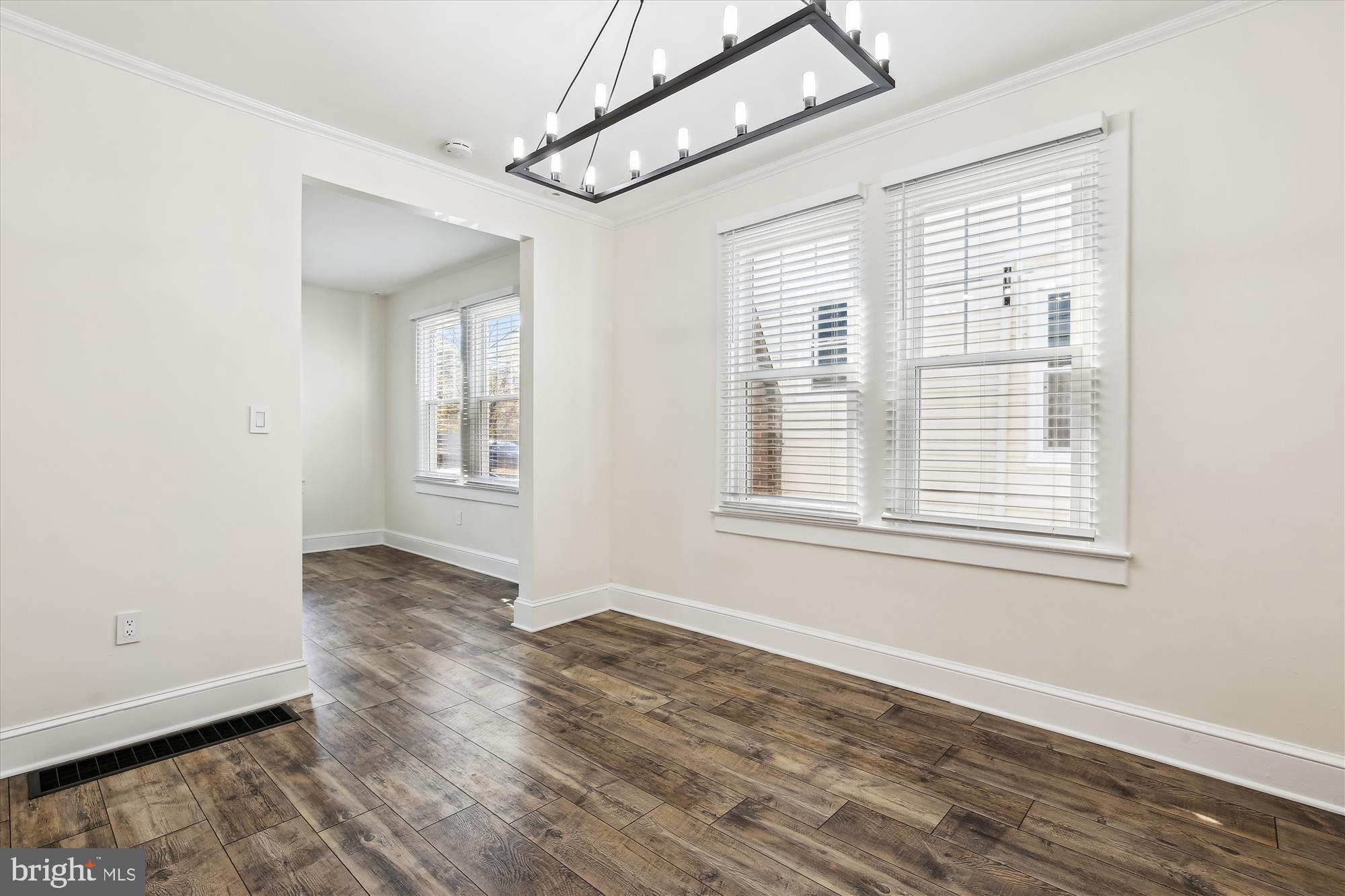 3107 9th Road North Arlington, VA 22201 - Photo 16 of 34 a view of an empty room with wooden floor and a window