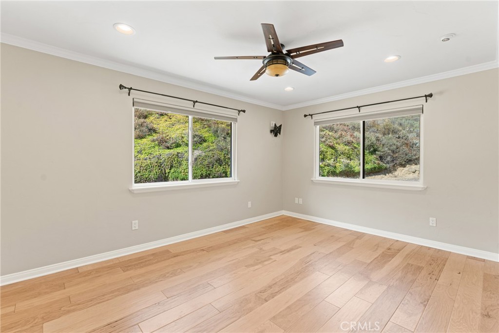 30300 Live Oak Canyon Road Redlands, CA 92373 - Photo 47 of 67 a view of empty room with wooden floor and fan