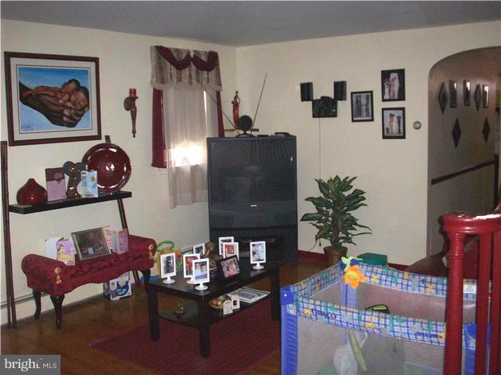 7119 Dungan Road Philadelphia, PA 19111 - Photo 4 of 15 a living room with furniture and wooden floor