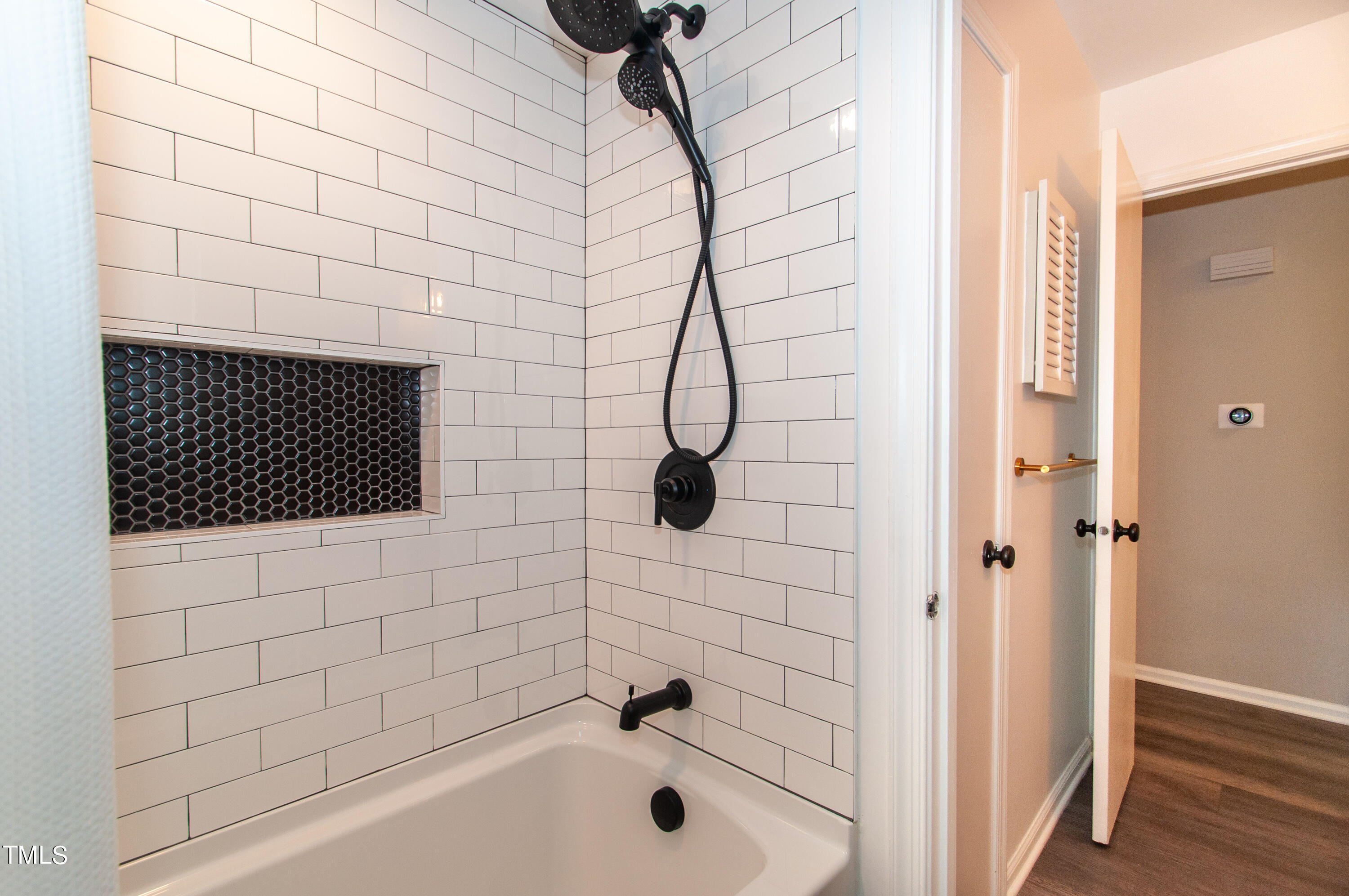 5817 Caledonia Street Raleigh, NC 27609 - Photo 16 of 46 Shower area master & hall bath (2)