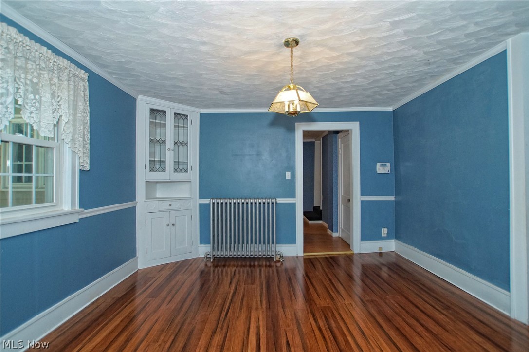 2586 County Line Road Madison, OH 44057 - Photo 6 of 31 Built-in china cupboard and original radiators.
