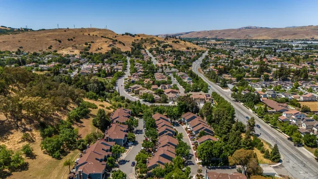 an aerial view of residential house with parking space