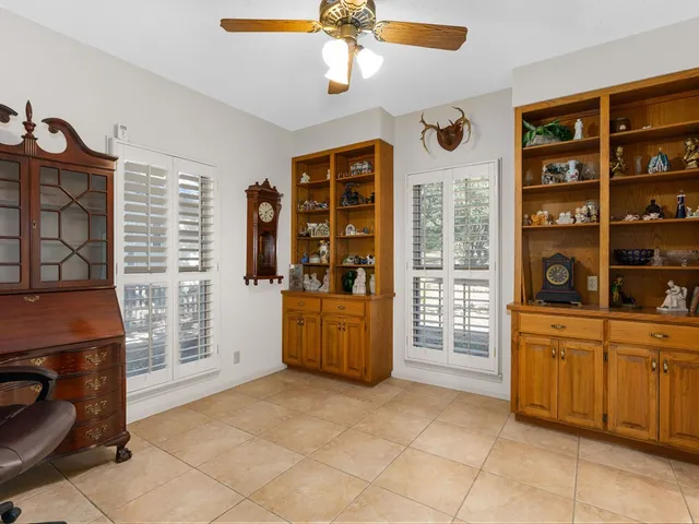 a kitchen with a stove and a cabinet