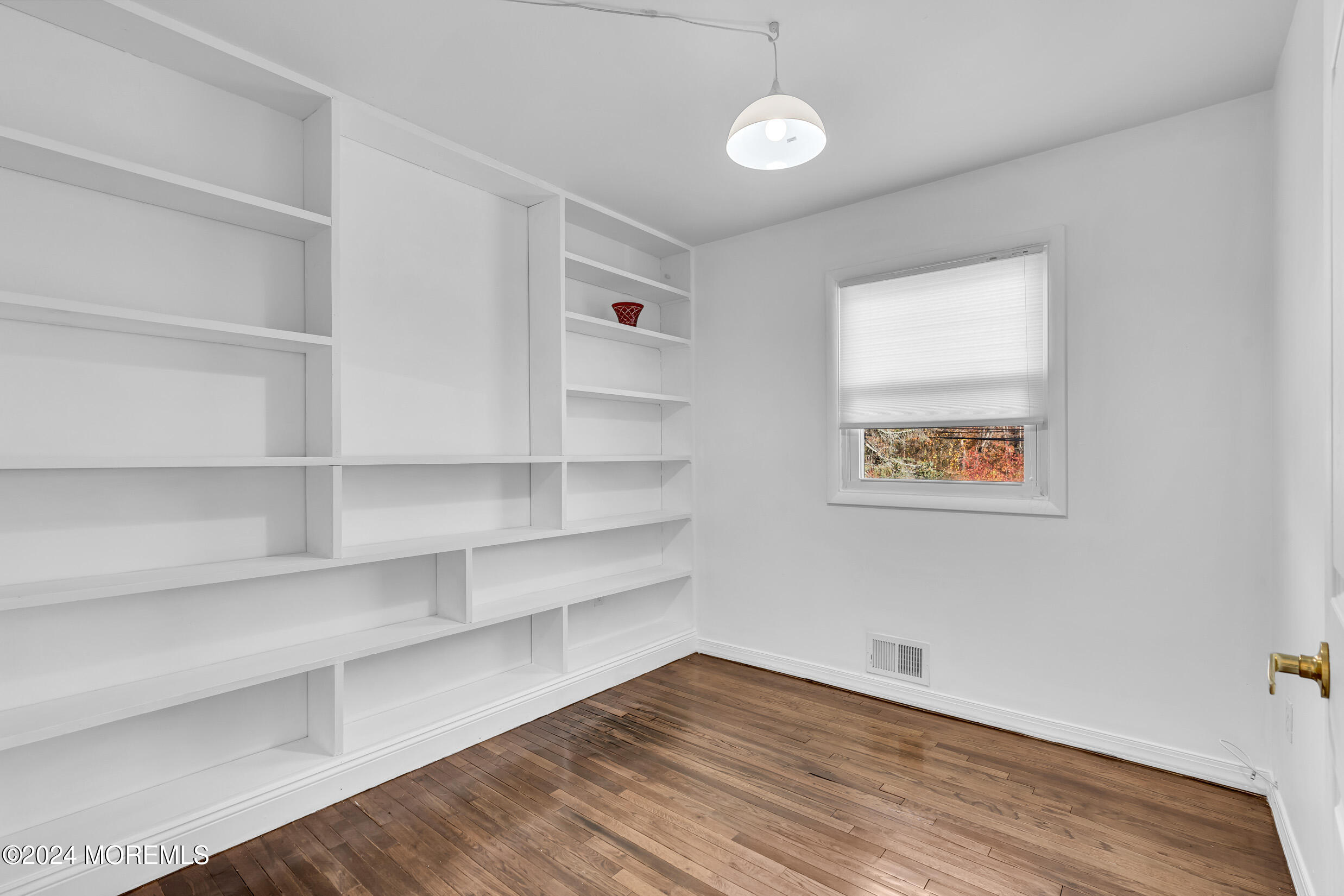306 Cedar Swamp Road Jackson, NJ 08527 - Photo 29 of 52 a view of a room with wooden floor and closet