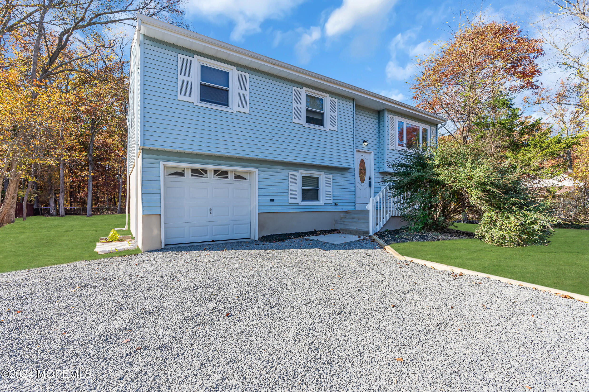 306 Cedar Swamp Road Jackson, NJ 08527 - Photo 8 of 52 a view of a house with a yard