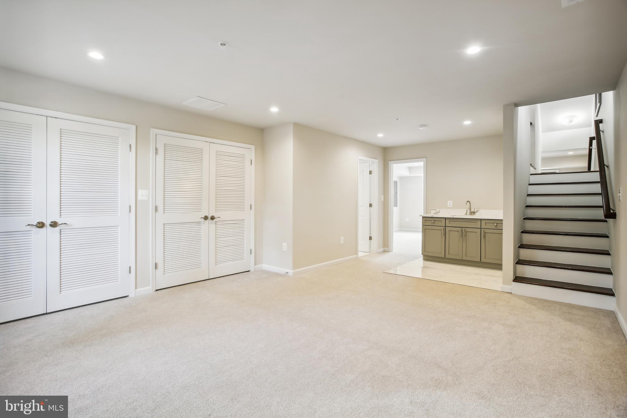 2433 Elvans Road Southeast Washington, DC 20020 - Photo 18 of 43 Recreation Room, Laundry & Wet Bar - Entry Level