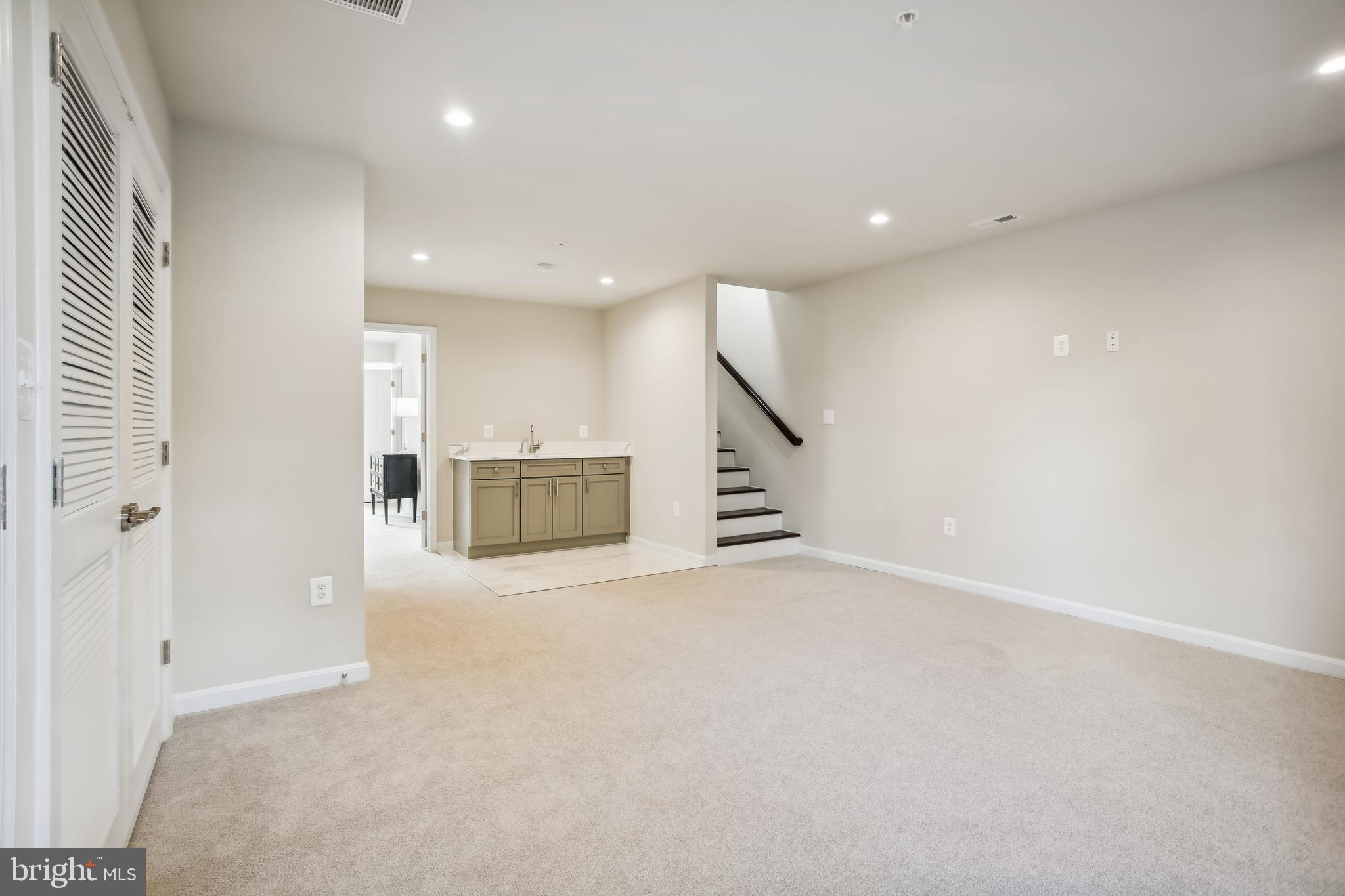 2433 Elvans Road Southeast Washington, DC 20020 - Photo 19 of 43 Recreation Room, Laundry & Wet Bar - Entry Level
