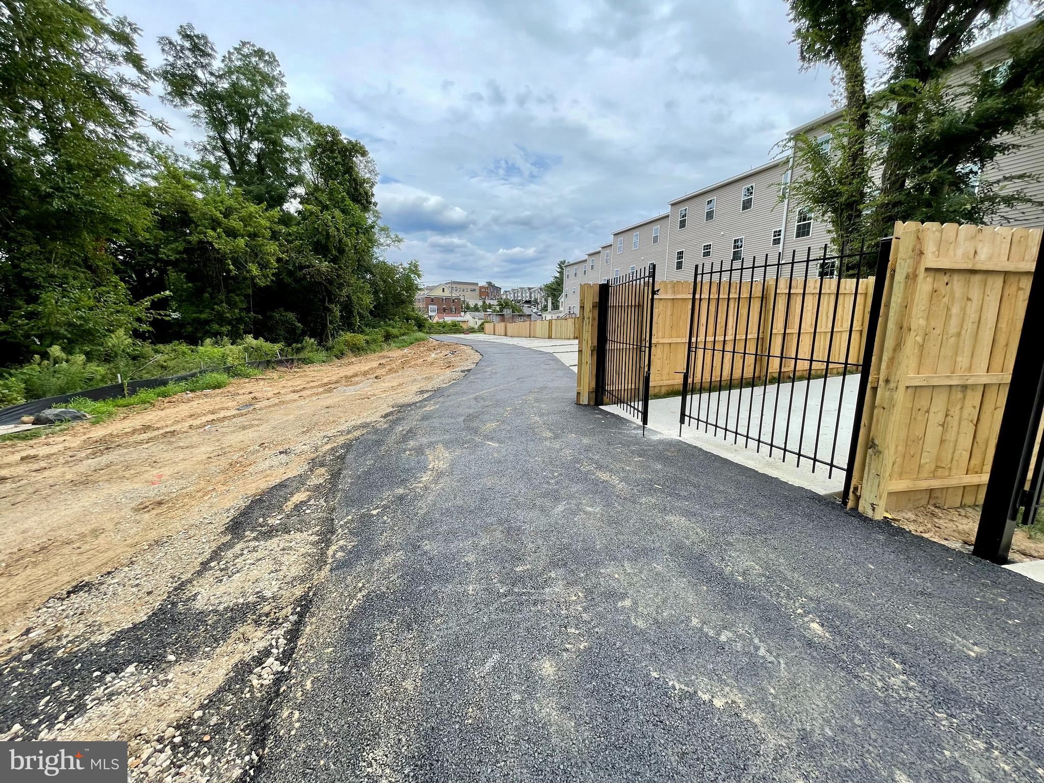 2433 Elvans Road Southeast Washington, DC 20020 - Photo 43 of 43 Driveway behind homes to access your Parking.