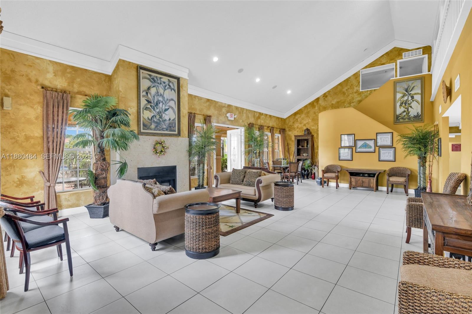 1255 Southwest 46th Avenue, Unit 1713 Pompano Beach, FL 33069 - Photo 25 of 37 a living room with fireplace furniture and a large window