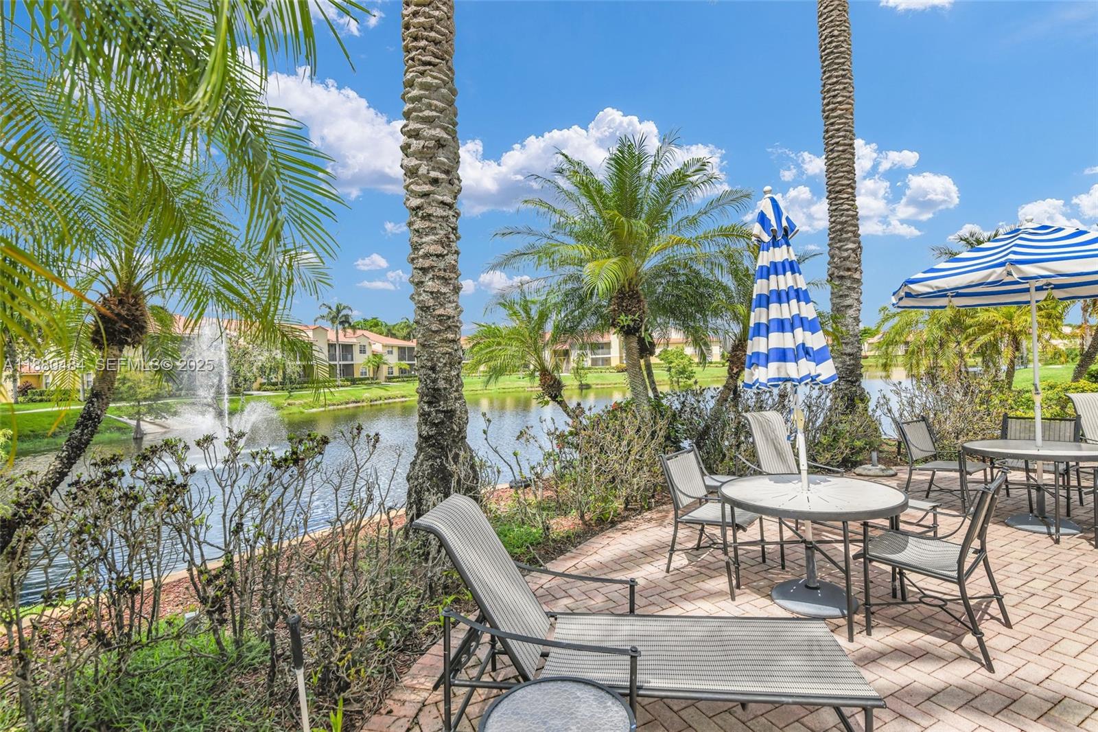 1255 Southwest 46th Avenue, Unit 1713 Pompano Beach, FL 33069 - Photo 29 of 37 a view of a outdoor seating area